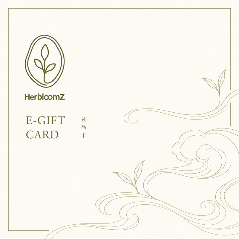 Red gift box with a bow on a white background, featuring 'HerbloomZ' brand.