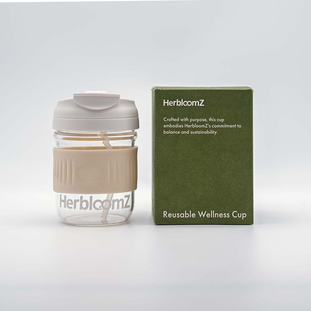 Reusable Wellness Cup with eco-friendly silicone sleeve and sustainable gift box packaging - HerbloomZ