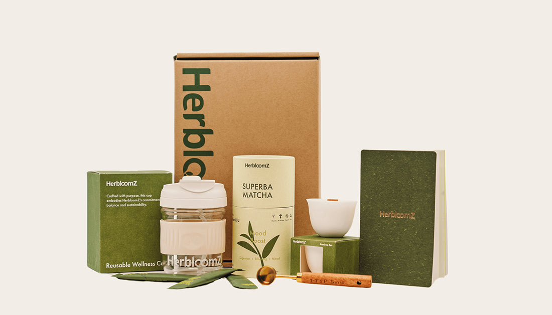 HerbloomZ SUPERBA Matcha Set gift box with probiotic matcha, bamboo candle, wellness cup, spoon, and journal — the complete wellness ritual