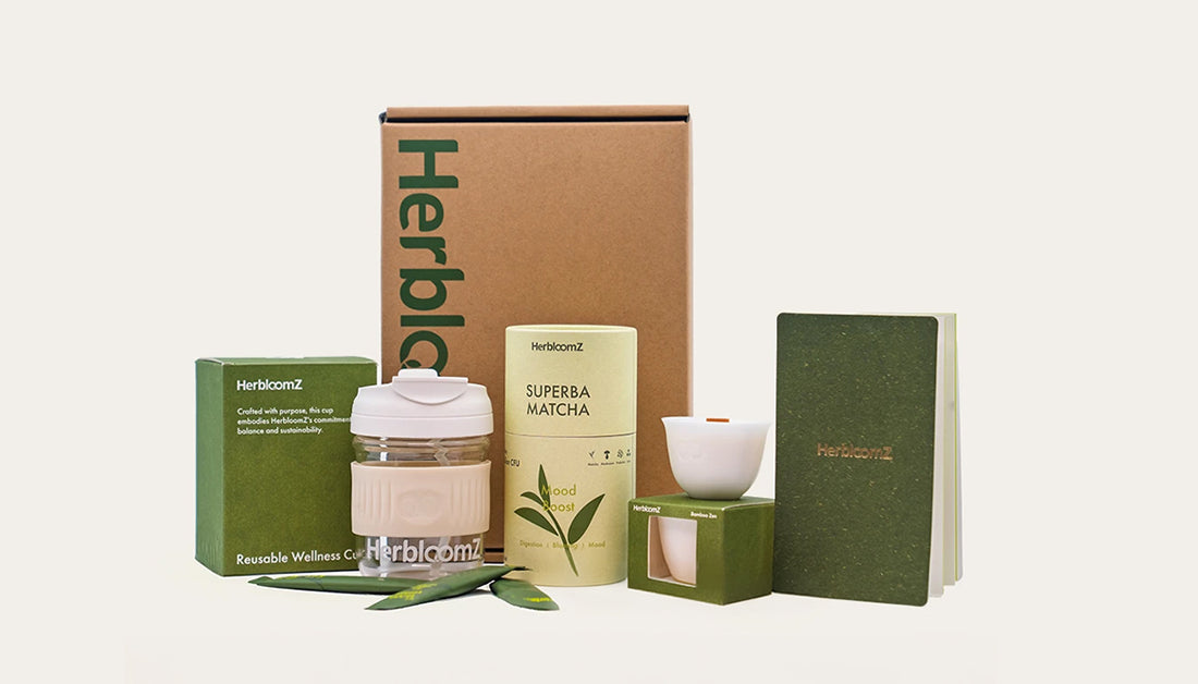 HerbloomZ SUPERBA Matcha Set gift box with probiotic matcha, bamboo candle, wellness cup, spoon, and journal — the complete wellness ritual