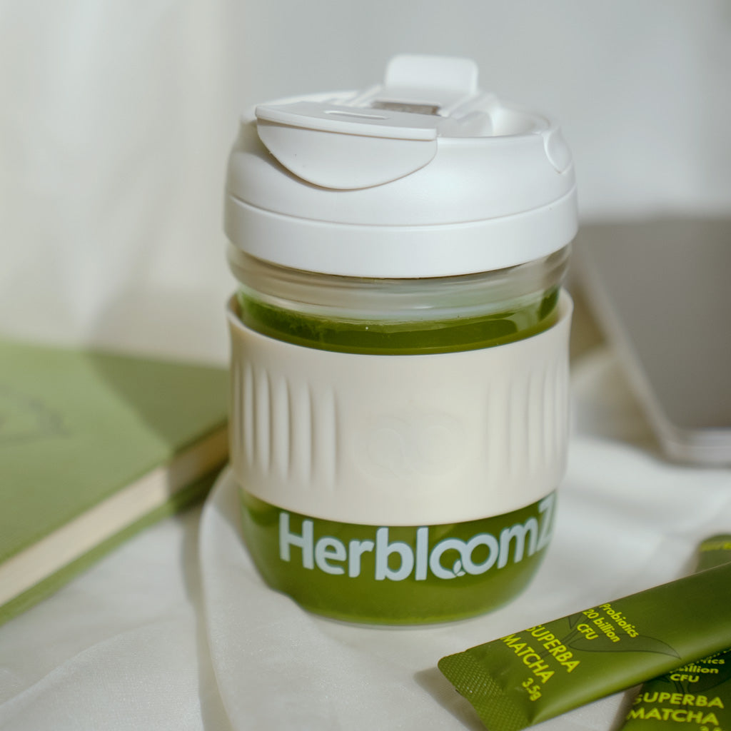 Portable matcha ritual kit by HerbloomZ - travel-friendly Wellness Cup with leak-proof lid plus convenient SUPERBA MATCHA sachets for stress relief and gut health anywhere