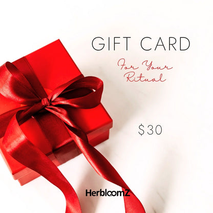Red gift box with a bow on a white background, featuring 'HerbloomZ' and a $30 gift card value.