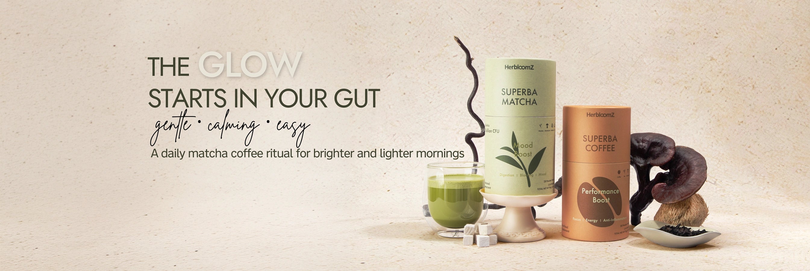 Superba Matcha and coffee packaging with a glass of matcha and matcha powder on a beige background.