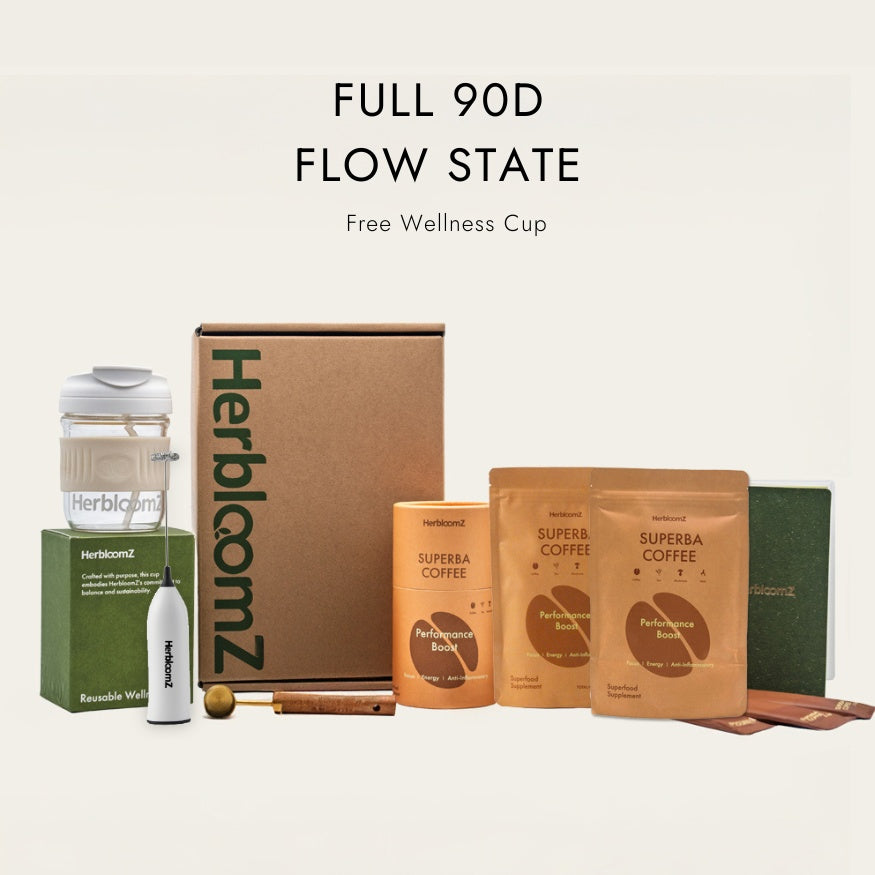 HerbloomZ product set including a reusable wellness cup, coffee packages, and a box on a light beige background.