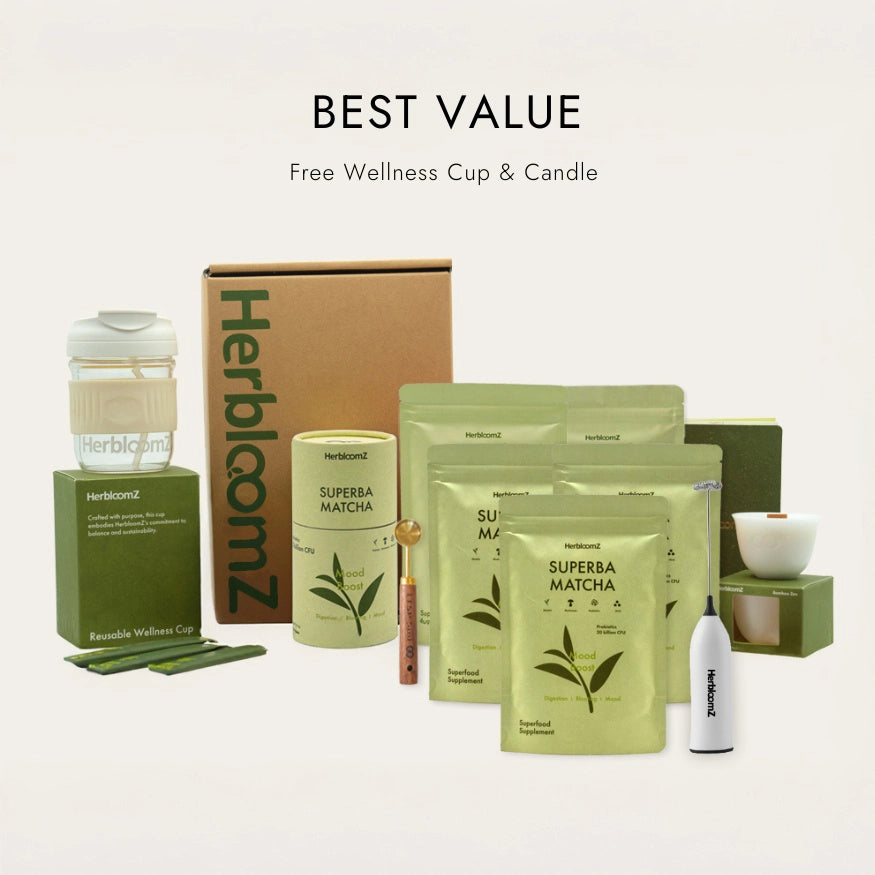 Herbaloomz wellness products including packaging, matcha powder, and a candle on a white background.