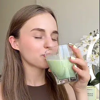Customer Polina enjoying a glass of SUPERBA Probiotic Matcha sharing her calm focus ritual